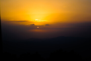 Sunset view from the mountains of Lansdowne. Mountain Sunset view in Lansdowne. Amazing  golden sunset seen through forest drive, Lansdowne Uttarakhand.