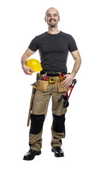 Smiling construction worker with tools and helmet
