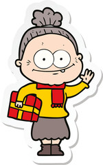 sticker of a cartoon happy old woman