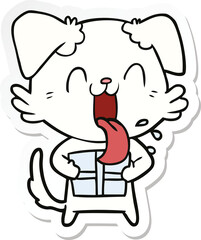 sticker of a cartoon panting dog with present