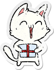 distressed sticker of a happy cartoon cat