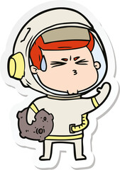 sticker of a cartoon stressed astronaut
