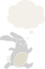 cartoon rabbit and thought bubble in retro style