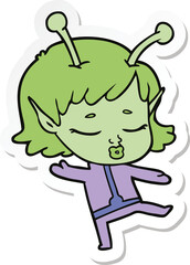 sticker of a cartoon alien girl