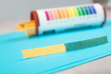 test strip with water sample, water PH testing