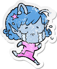 distressed sticker of a cartoon crying alien girl