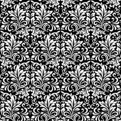 Wallpaper in the style of Baroque. Seamless vector background. White and black floral ornament. Graphic pattern for fabric, wallpaper, packaging. Ornate Damask flower ornament