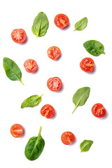 food background cherry tomatoes and spinach leaves isolated on white background.