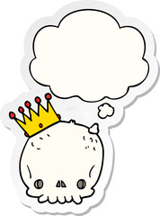 cartoon skull with crown and thought bubble as a printed sticker