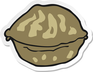 sticker of a cartoon walnut in shell