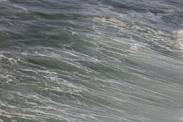 View on a wave on the Northern beach located in Nazaré in the Oeste region, in the historical...