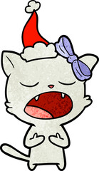 textured cartoon of a cat meowing wearing santa hat