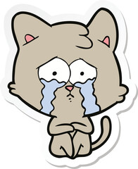 sticker of a crying cat cartoon