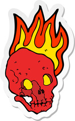 sticker of a cartoon flaming skull
