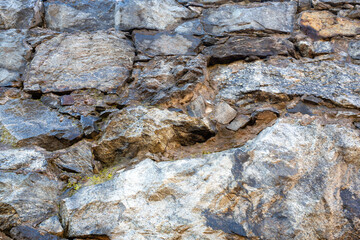 Old wall with wet stones