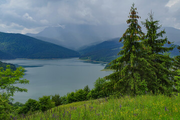 Fototapeta na wymiar Beautiful landscape of Izvorul Muntelui lake at the hydroelectric dam in Transylvania. A view of Bicaz Dam in Romanian Carpathians, Europe