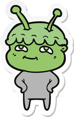 sticker of a friendly cartoon spaceman