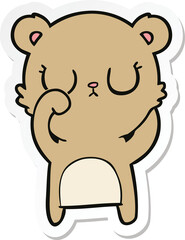 sticker of a peaceful cartoon bear