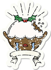 grunge sticker of tattoo style christmas pudding character crying