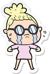 Obraz premium sticker of a cartoon crying woman wearing spectacles
