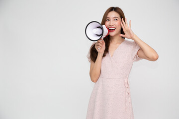 Young Asian woman holding megaphone isolated on white background, Speech and announce concept