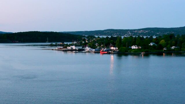 Oslo, Norway: Small island Lindoya with marina in the fjord of Oslo in the morning light