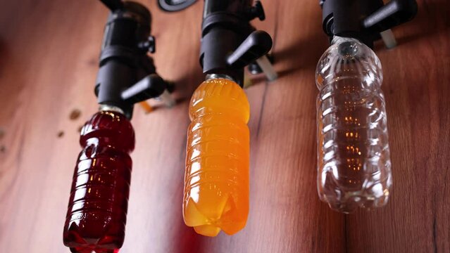 Beer shop. Beer is poured into a plastic bottle at a beer shop