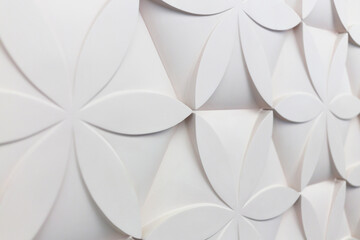 Volume wall decoration, ornament of the repeating patterns of 3D-like flower petals, architecture...