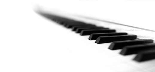 Naklejka premium Bright White Piano Keys on Old Piano Close up High Toned Panoramic