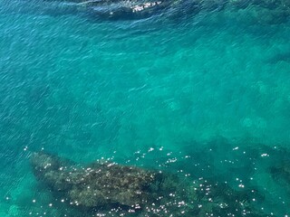 Sea water blue turquoise clear surface beautiful seascape aerial view.