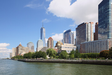 Embankment with tall buildings and Robert F. Wagner Jr. Park on coast Manhattan in New York City