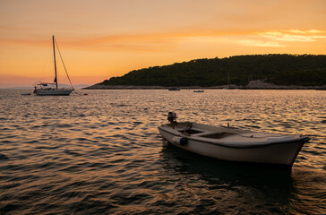 Sail Boat Yacht at Sunset or Sunrise off the coast of Hvar and Vis Islands, Croatia