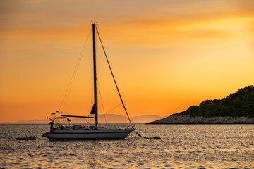 Sail Boat Yacht at Sunset or Sunrise of the Coast of Hvar, Croatia - 751626980