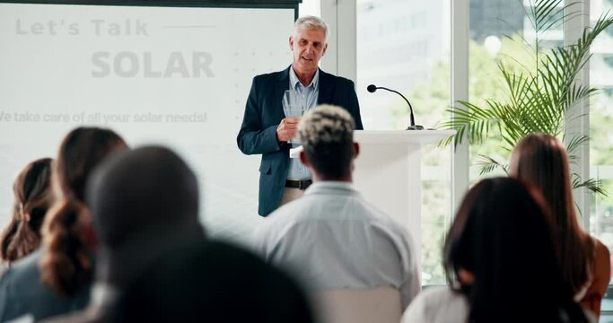 Business, crowd and man with an award, celebration and climate change activist with presentation. Mature person, employee or audience with support and corporate with a speech or winner with prize