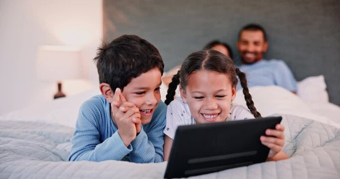 Tablet, smile and kids on bedroom in home, learning or watch cartoon of family bonding together. Technology, happy children or siblings in bed on internet for game, conversation or relax with parents