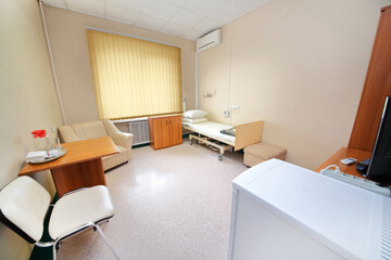  comfortable hospital ward with single bed, tables, television set, conditioner and fridge in multidisciplinary Clinic Center Endosurgery and Lithotripsy