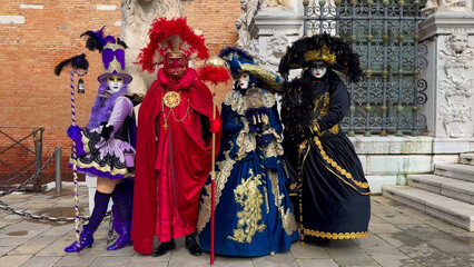 Fototapeta na wymiar Venice Carnival. People in Venetian carnival masks and costumes on streets of Venice, Italy, Europe February 10, 2024