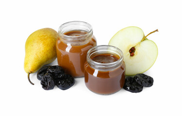 Jars with healthy baby food, dried prunes, pear and half of apple isolated on white