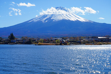 Day view of the snow-capped Mount Fuji in the fall in Lake Kawaguchi (Fujikawaguchiko), Japan - 751656592