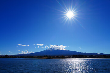 Day view of the snow-capped Mount Fuji in the fall in Lake Kawaguchi (Fujikawaguchiko), Japan - 751656718