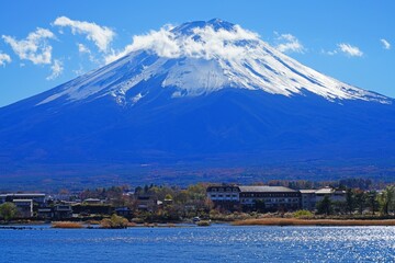 Day view of the snow-capped Mount Fuji in the fall in Lake Kawaguchi (Fujikawaguchiko), Japan - 751656738