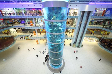 Papier Peint photo Lavable Moscou  Aquarium as a tall column inside the shopping and entertainment complex Aviapark, top view