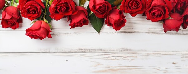 Bunch bouquet of red roses on white vintage wooden texture background banner panorama, top view with space for text - obrazy, fototapety, plakaty