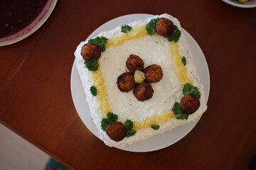 Vegan sandwich cake (voileipäkakku, smörgåstårta, voileivtort). Healthy and delicious savory home made cake for summertime celebrations. Common in Finland and Sweden. Closeup color image.