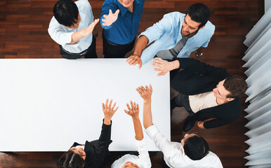 Panorama banner top view group of diverse office worker join hand over meeting table. Business...