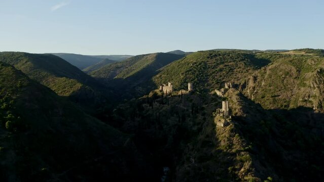Aerial shot during the sunset of the four castles of Lastours in the south of France.
