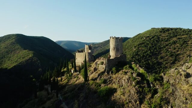 Aerial shot during the sunset of the four castles of Lastours in the south of France.
