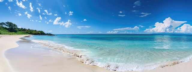 Obraz premium panoramic sandy beach and clear blue skies, banner format, copy space