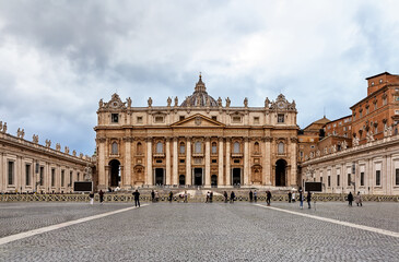 Fototapeta na wymiar Saint Peter Basilica and Saint Peter's Square (Piazza San Pietro) in Vatican City at Rome, Italy.