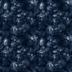 Indigo blue and white tie-dye seamless textile pattern.